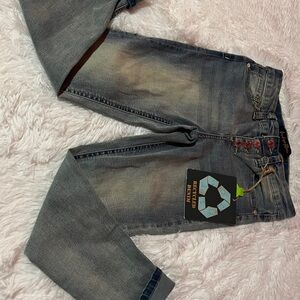 Stylish Faded Jeans with Red Button Accents